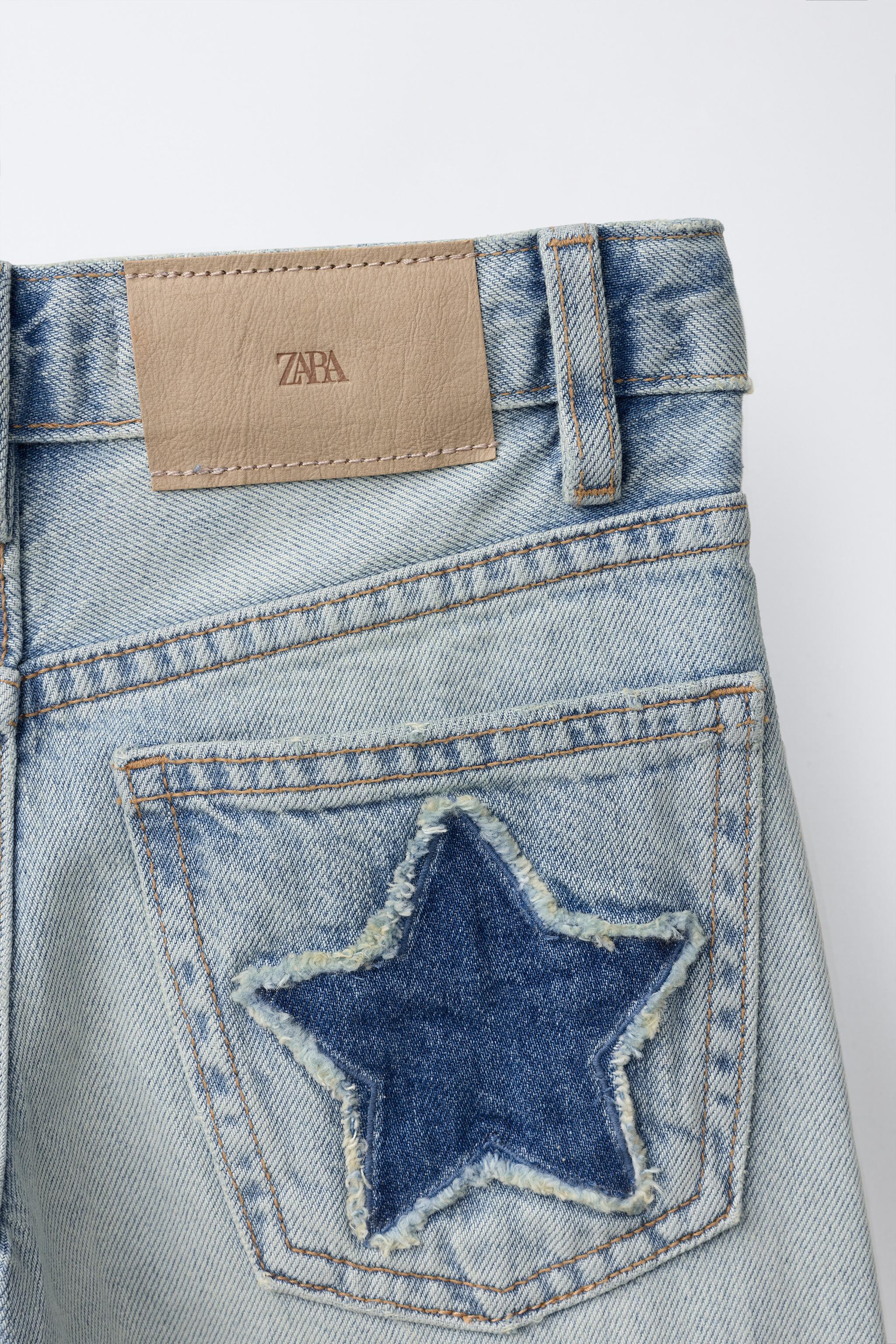 JEANS WIDE LEG À CLOUS